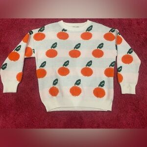Cider- Oversized white sweater with orange design